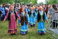 Russia, Magnitogorsk, - June, 15, 2019. Older women in colorful clothes - participants of the parade during Sabantuy - the