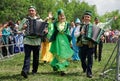 Russia, Magnitogorsk, - June, 23, 2018. Street parade in traditional costumes during Sabantuy - the national holiday of the plow.