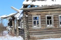 Wooden old ruined house in the village. Royalty Free Stock Photo