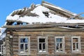 Wooden old ruined house in the village. Royalty Free Stock Photo