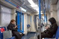 Russia, Moscow, April 2020. An empty subway car. Quarantine in Moscow. People in disposable masks