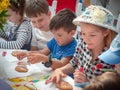 Russia, Moscow 26 april, 2019: Master class on Manezhnaya Square for children on Easter. Preschool children at a master