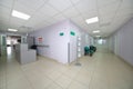 empty corridor with reception and chairs in Royalty Free Stock Photo