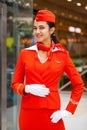 RUSSIA, MOSCOW: 01 AUGUST 2019. Beautiful stewardess dressed in official red uniform Aeroflot Airlines