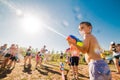 Russia. Moscow. August 11, 2018 Children playing outdoors with water cannons on a beautiful sunny day
