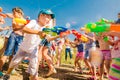 Russia. Moscow. August 11, 2018 Children playing outdoors with water cannons on a beautiful sunny day