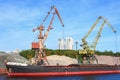 Russia, Moscow August 2018: Unloading of the barge with crushed stone port