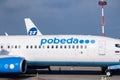 Russia Moscow 2019-06-17 Boeing 737 Pobeda Airlines russian company lowcost price arrived to airport, standing on airplane parking Royalty Free Stock Photo