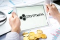 Russia Moscow 05.05.2021.Businessman holding tablet with logo of cryptocurrency stock exchange Cryptopia.Buy,sell,change crypto