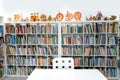 Russia Moscow 25.09.20 Children`s city library. Special reading kids room with bright ceramic figures, toys. Many shelves, bright