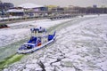 russia moscow december 17 2020. The tug goes along the fairway laid in the ice of the river. Winter