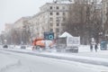 13.02.2021, Russia, Moscow. Dump trucks taking the collected snow from the streets of the city.