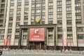 Russia Moscow 08.05.2023.Facade State Duma building with red poster May 9 is Victory Day