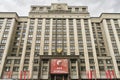 Russia Moscow 08.05.2023.Facade State Duma building with red poster May 9 is Victory Day