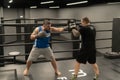 RUSSIA, MOSCOW - FEB 14, 2022: boxing training gym young gloves, from fitness boxer in athlete from strong male