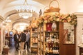 06.09.2019 Russia, Moscow, Gum, Gastronomo Ã¢ââ 1. Foreign tourists make purchases in the department of alcoholic beverages in the