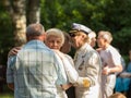 26.07.2020 Russia, Moscow. happy coulpe on the nature. Older people dancing on the dance floor in the summer