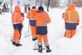Russia Moscow 13.02.2021 Heavy snowfall,snow winter collapse,blizzard in city.Team of janitors in uniform cleans road