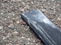 10.03.2021 Russia, Moscow. The honor phone that fell to the ground and crashed lies on the asphalt. Cracked glass, phone repair,