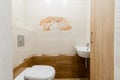 Russia, Moscow- July 16, 2019: interior room apartment. standard repair decoration in hostel. bathroom, sink, decoration elements