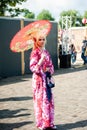 Russia, Moscow-July 21, 2019: Japanese culture festival j-FEST, cosplay girl with a Japanese outfit with an umbrella.