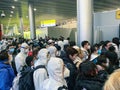 Russia, Moscow - 22 March 2020 : Many China tourists travellers in masks and suits anti coronavirus in International