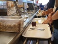 Russia, Moscow, May 2019. Communal dining room. Public eatery. Office workers pick food