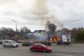 Russia, Moscow, Mytishchi, October 1, 2014 - the Yaroslavl highway, M8, work to expand the road, the house is burning, the fire