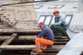 30.08.2020 Russia, Moscow. Replacing the roof in an apartment building . Workers dismantle the roof