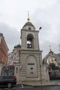 bell-ringer at work on belfry of Russian Orthodox church