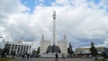 Russia, Moscow-September, 2019: Monument of white rocket on background of walking tourists. Action. Bottom view of large