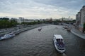 Russia Moscow 2017.05.20: Ship, boat on the Moscow river in the evening, on the background of the Kremlin