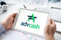 Russia Moscow 06.05.2021.Tablet with logo of Advcash,payment service,system,platform for cryptocurrency.Wallet for using