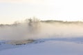 Russia, Moscow, Tsaritsyno Park. The winter, the sunset, the mist on the pond.