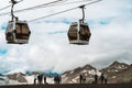 Russia, Mount Elbrus, 08.20.2021 - Cable car on Mount Elbrus and a group of tourists