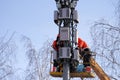 Russia, Naberezhnye Chelny, March 10, 2021: technicians maintain the cellular communication mast