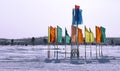 Russia, Nadym. Festive flags on the background of the Northern n