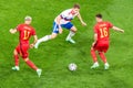 Russia national football team defender Igor Diveev against Belgium players Yannick Carrasco and Thorgan Hazard during EURO 2020