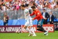 Russia national football team midfielder Fedor Smolov against Spain centre-back Gerard Pique during FIFA World Cup 2018 Round of Royalty Free Stock Photo