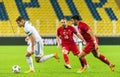 Russia national football team midfielder Roman Zobnin against Turkey players Hakan Calhanoglu and Ozan Tufan during UEFA Nations Royalty Free Stock Photo