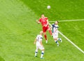 Russia national football team striker Artem Dzyuba against Finland players Paulus Arajuuri and Joona Toivio during EURO 2020 match Royalty Free Stock Photo