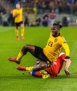 Russia national team defender Georgi Dzhikiya tackling against Belgium national football team striker Michy Batshuayi Royalty Free Stock Photo