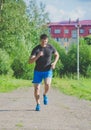 Russia Nikolskoe July 2016 competition at crossfit athletic man runs to the finish the first one