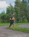 Russia Nikolskoe July 21016 competition at crossfit athletic man runs to the finish line