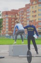 Russia Nikolskoe July 2016 competition for crossfit sporty girl in blue jumps on the curb