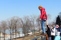 Russia, Nizhny Novgorod, Fedorovsky Embankment.04.10.2021. Jump with rope from the bridge, roupjamping, a man jumps from