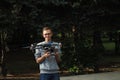 Russia Nizhny Novgorod 103 Gagarina Avenue 03/07/2021 drone pilot. The young man holds the drone controller in his