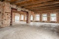 Russia, Nizhny Novgorod - March 20, 2019: Office. Loft studio Interior in old house. Big windows, brick red wall. House Royalty Free Stock Photo