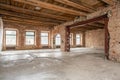 Russia, Nizhny Novgorod - March 20, 2019: Office. Loft studio Interior in old house. Big windows, brick red wall. House Royalty Free Stock Photo