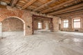 Russia, Nizhny Novgorod - March 20, 2019: Office. Loft studio Interior in old house. Big windows, brick red wall. House Royalty Free Stock Photo